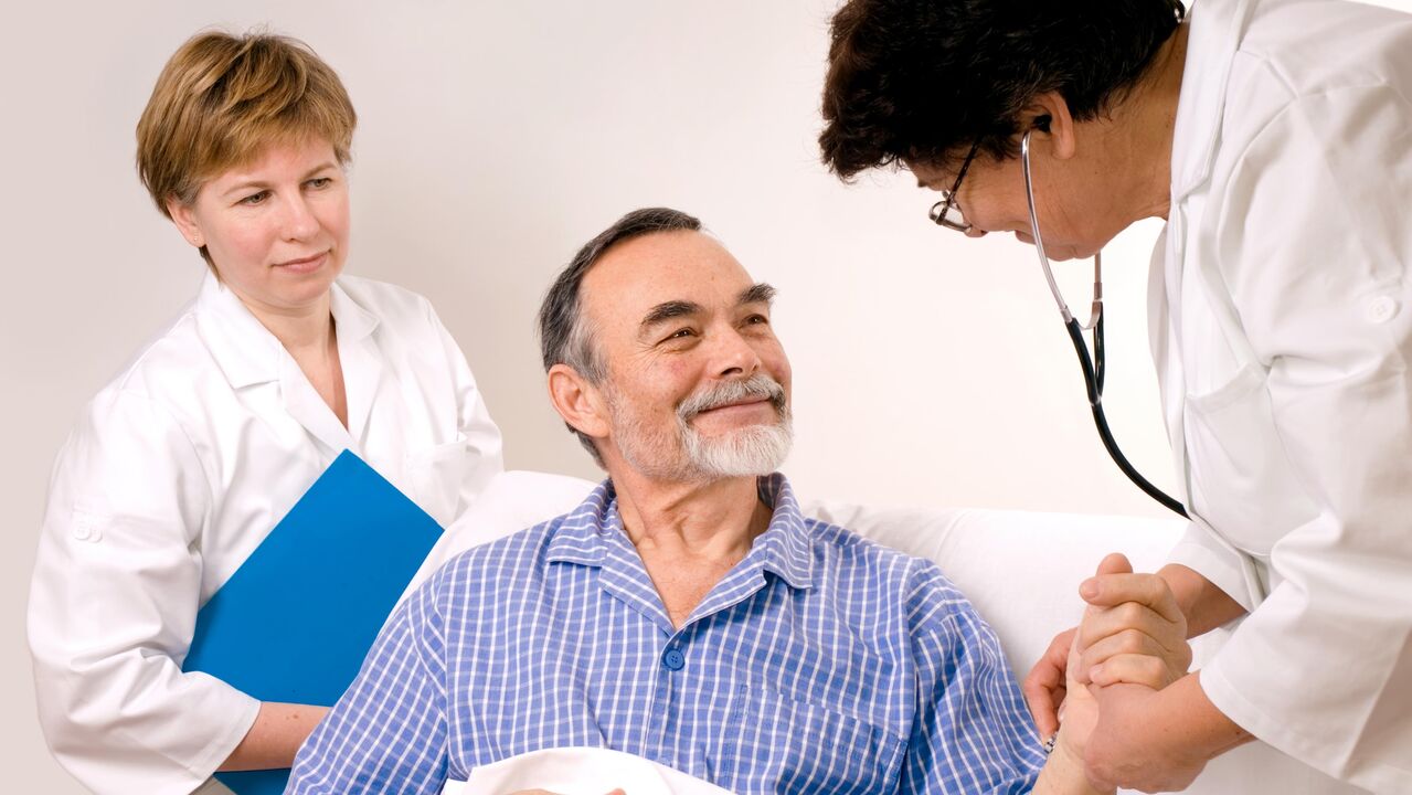 a doctor is treating a patient with prostatitis